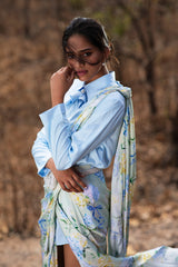 Blue Bows and Blooms printed pre-draped saree and blue structured shirt.